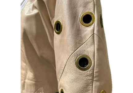 VESTE EN CUIR ŒILLETS