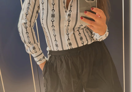 Chemise Céline vintage à motif Triumph – Taille 36